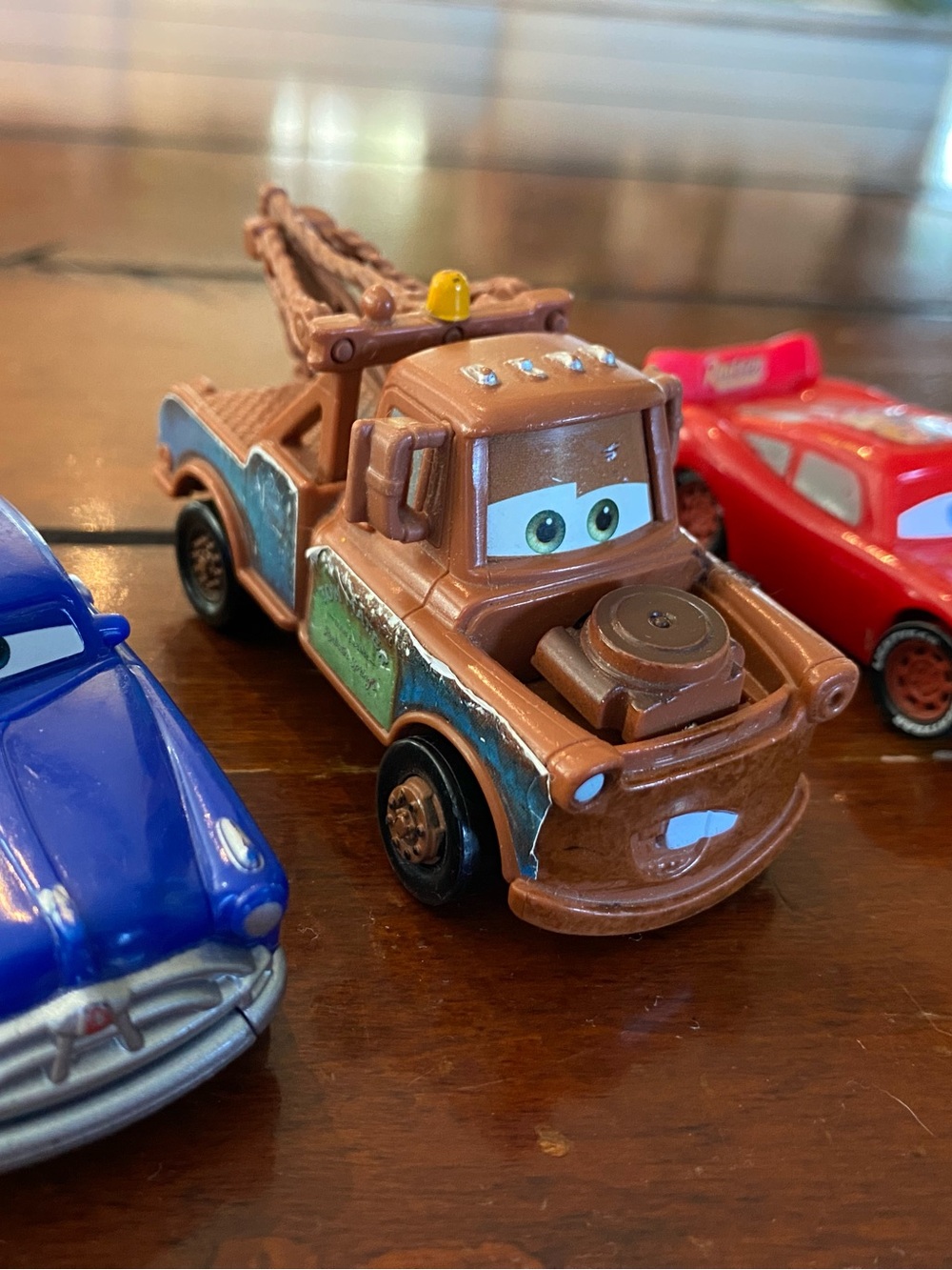 Lightning McQueen, Mater & Doc. Can stick out wheels and/or tongue